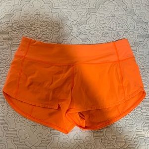 Neon orange lulu speed up shorts!!